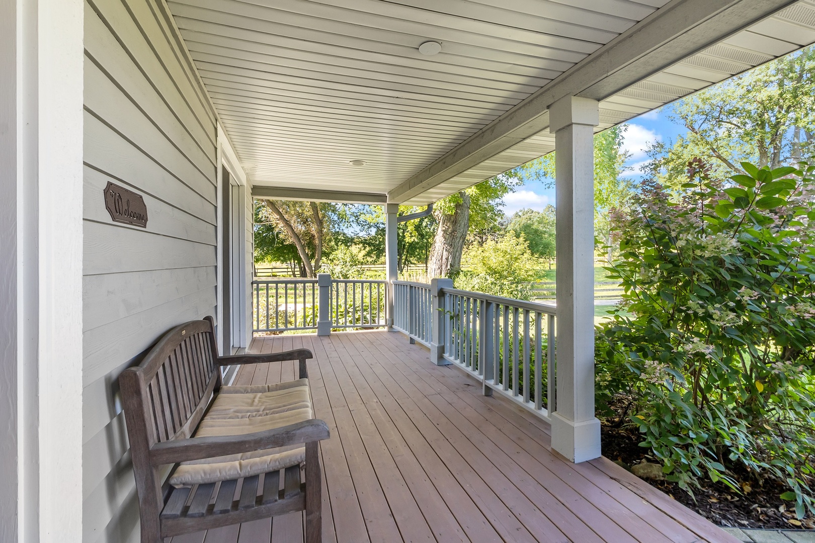 19303 McGuire Road Harvard, IL 60033 - Photo 16 of 36 a view of a porch with wooden floor and outdoor space