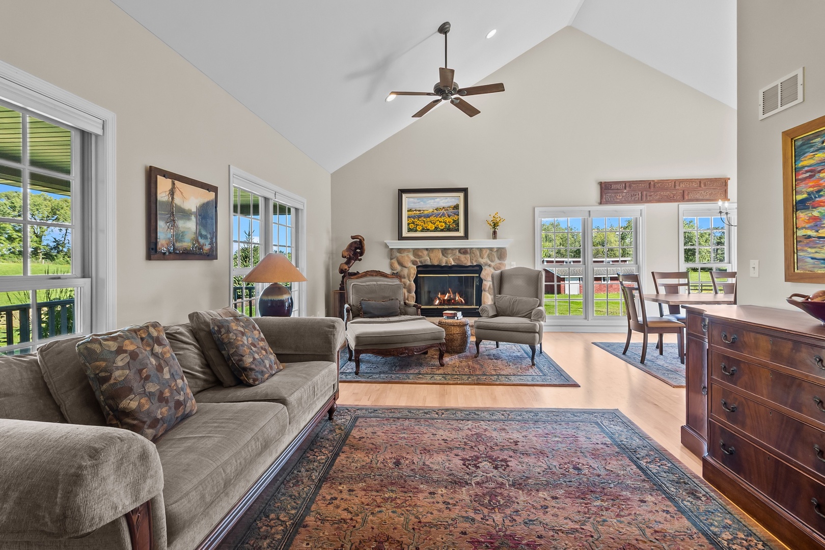 19303 McGuire Road Harvard, IL 60033 - Photo 18 of 36 a living room with furniture a rug and a large window