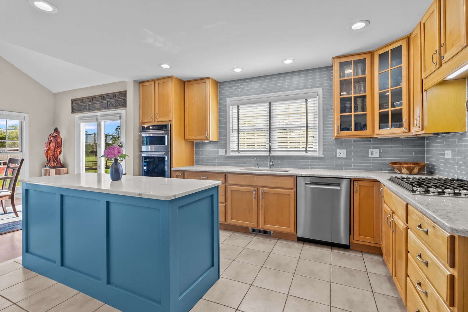 19303 McGuire Road Harvard, IL 60033 - Photo 22 of 36 a kitchen with stainless steel appliances granite countertop a stove a sink and a microwave