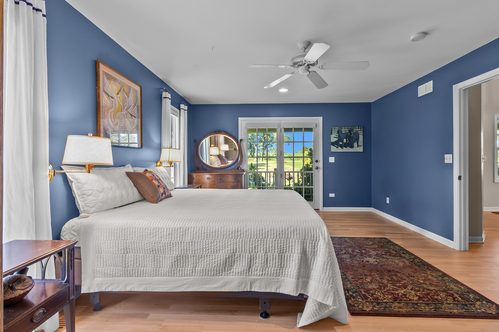 19303 McGuire Road Harvard, IL 60033 - Photo 25 of 36 a bedroom with a large bed and a window