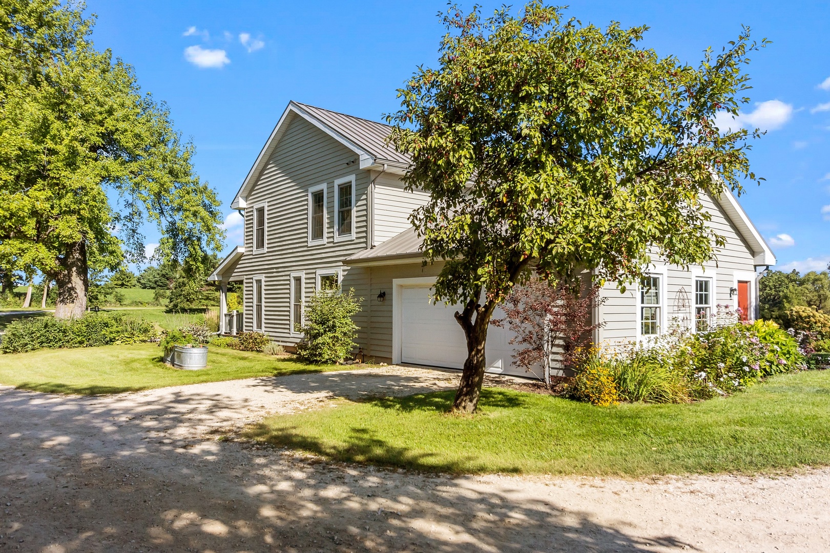 19303 McGuire Road Harvard, IL 60033 - Photo 4 of 36 a front view of house with yard and green space