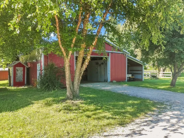 a view of a porch with wooden floor
