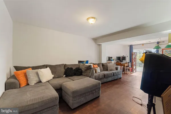 a living room with furniture and a couch