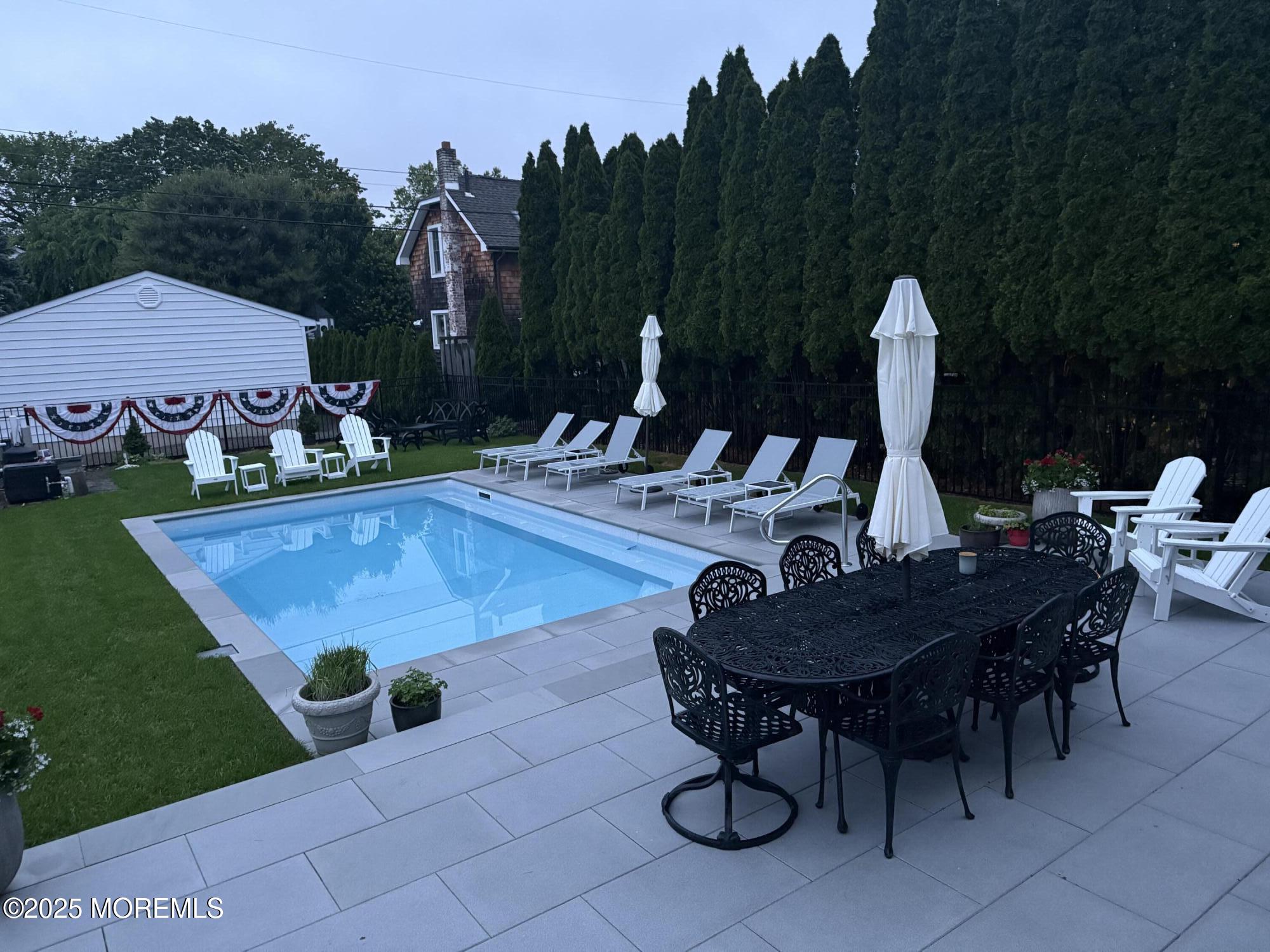 502 Tuttle Avenue Spring Lake, NJ 07762 - Photo 2 of 36 a view of yard with furniture and garden