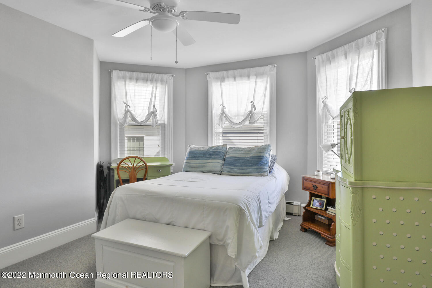 502 Tuttle Avenue Spring Lake, NJ 07762 - Photo 27 of 36 a bedroom with a bed and a window