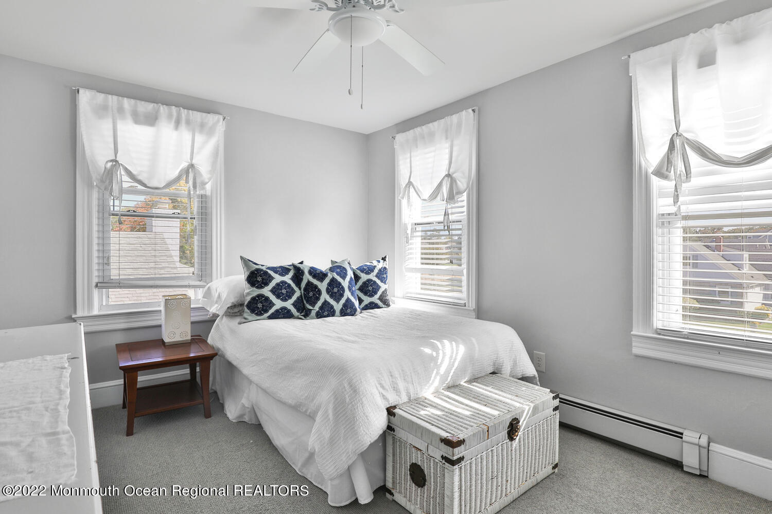 502 Tuttle Avenue Spring Lake, NJ 07762 - Photo 28 of 36 a bedroom with a bed and a window