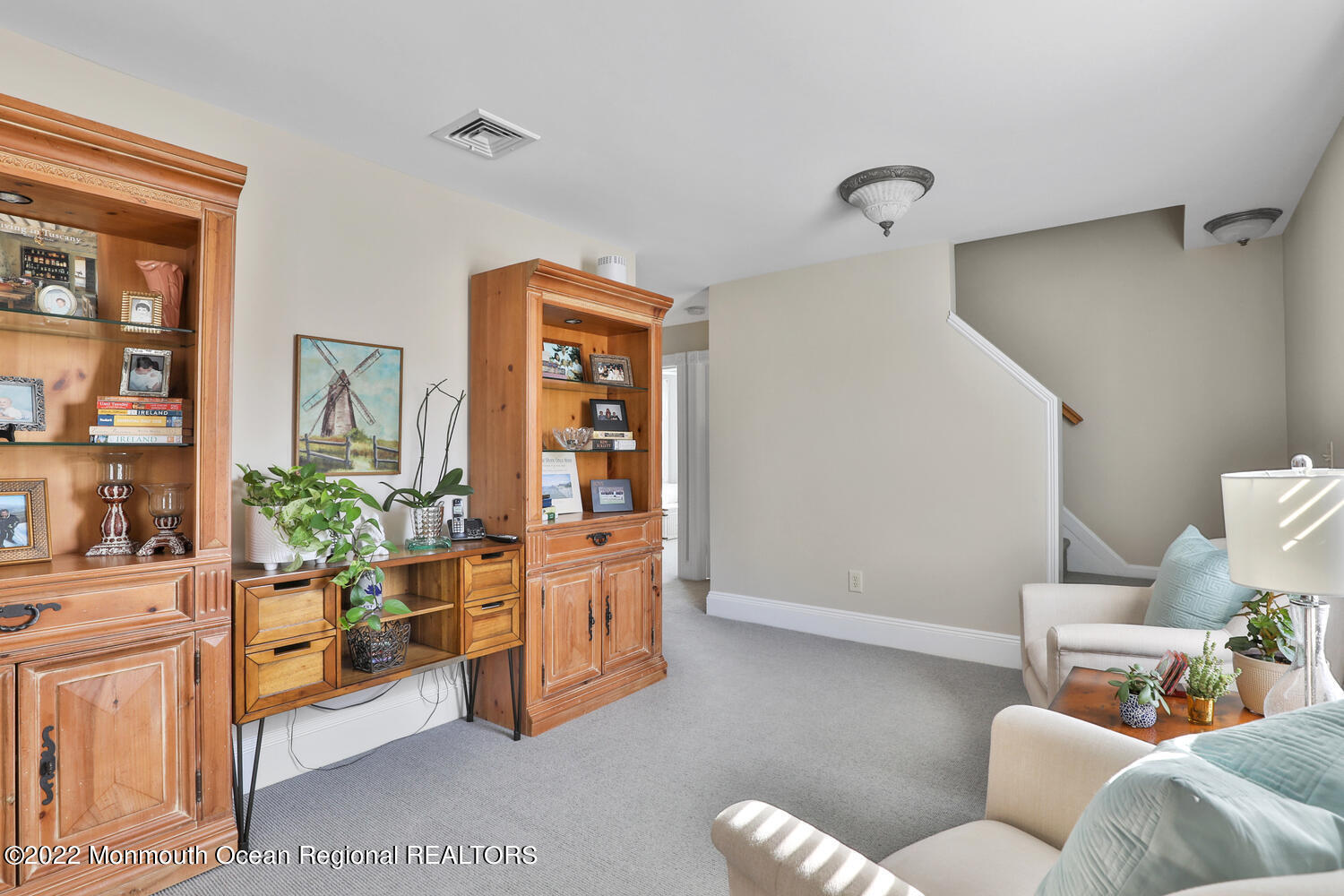 502 Tuttle Avenue Spring Lake, NJ 07762 - Photo 30 of 36 a living room with furniture and wooden floor