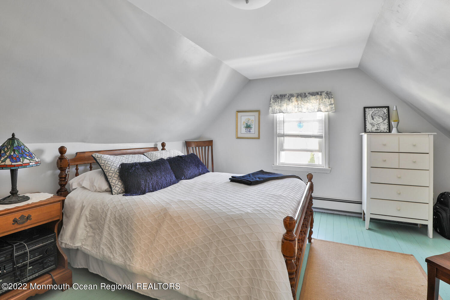 502 Tuttle Avenue Spring Lake, NJ 07762 - Photo 33 of 36 a bedroom with a bed and a window