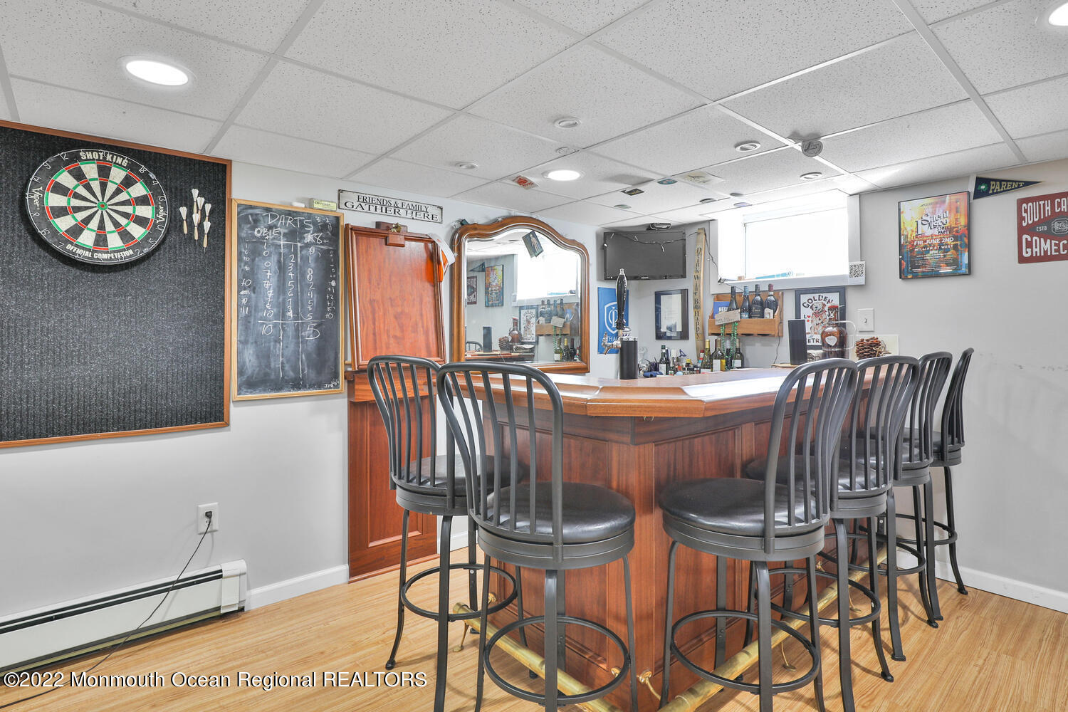 502 Tuttle Avenue Spring Lake, NJ 07762 - Photo 36 of 36 a dining area with furniture and a large window
