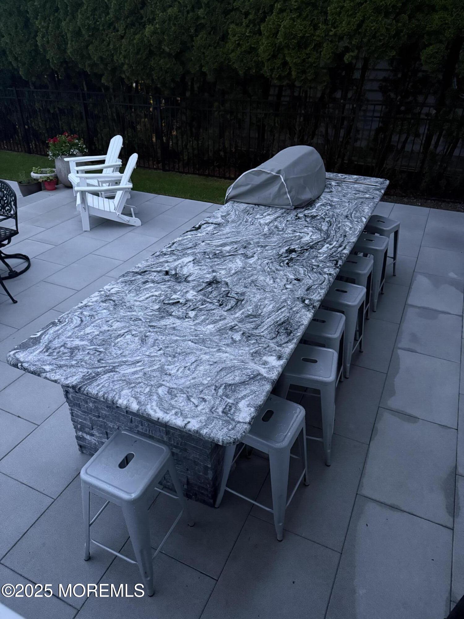 502 Tuttle Avenue Spring Lake, NJ 07762 - Photo 6 of 36 a backyard of a house with outdoor seating