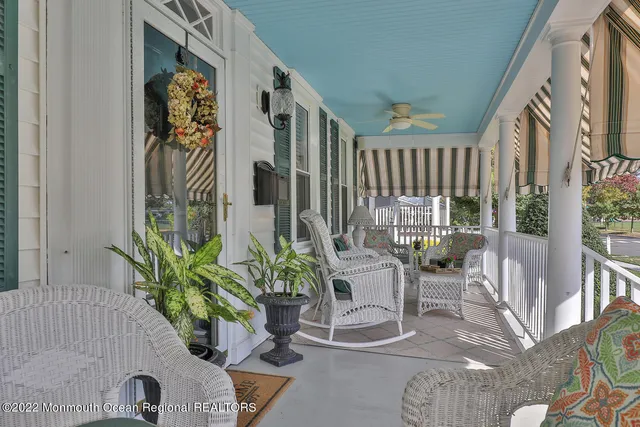 a view of balcony with furniture