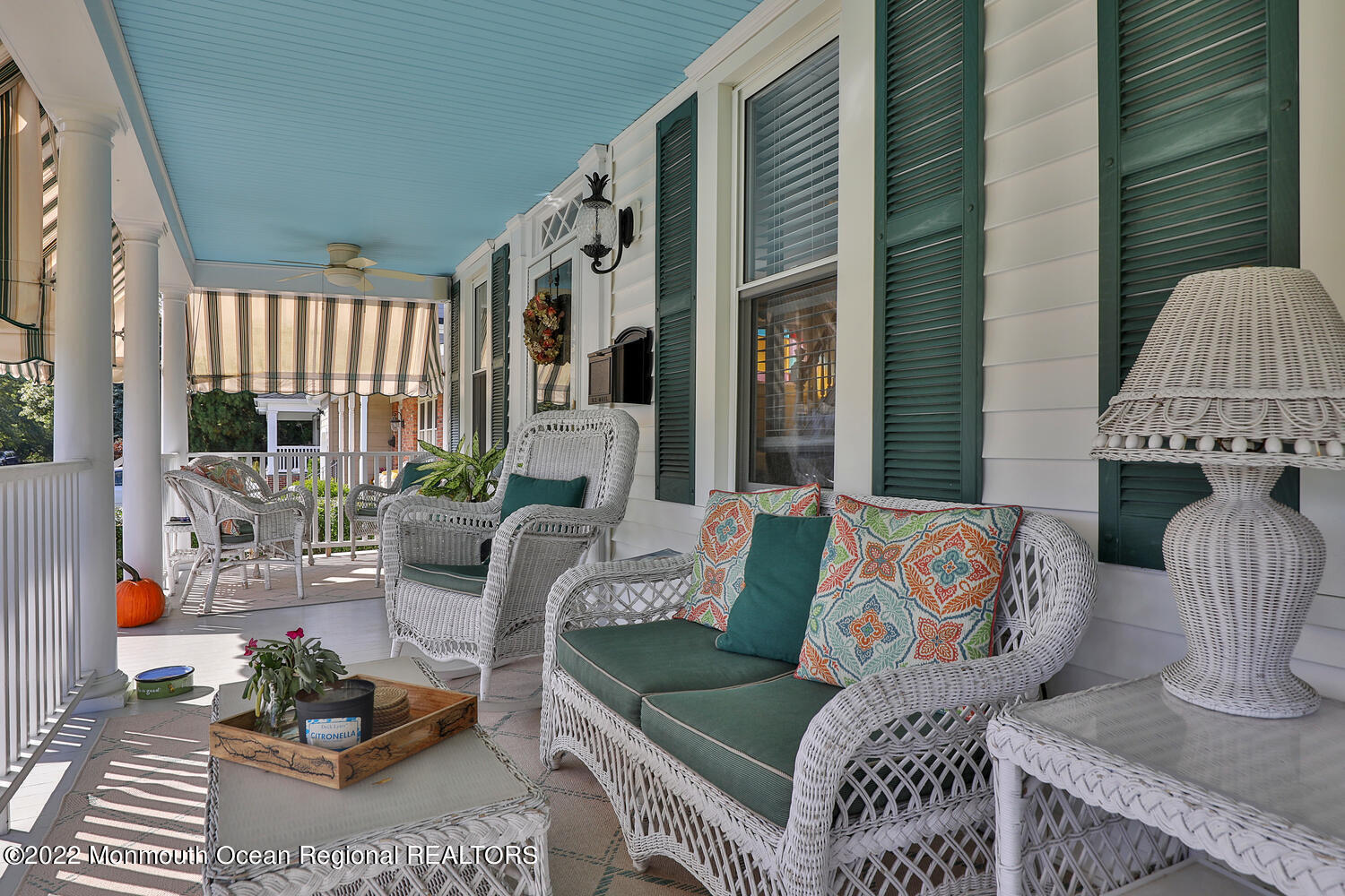 502 Tuttle Avenue Spring Lake, NJ 07762 - Photo 9 of 36 a outdoor living space with furniture and a fireplace