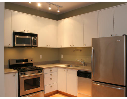 114 West Concord Street, Unit 2 Boston, MA 02118 - Photo 4 of 9 a kitchen with a sink and a stove top oven