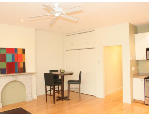 114 West Concord Street, Unit 2 Boston, MA 02118 - Photo 5 of 9 a view of a dining room with furniture