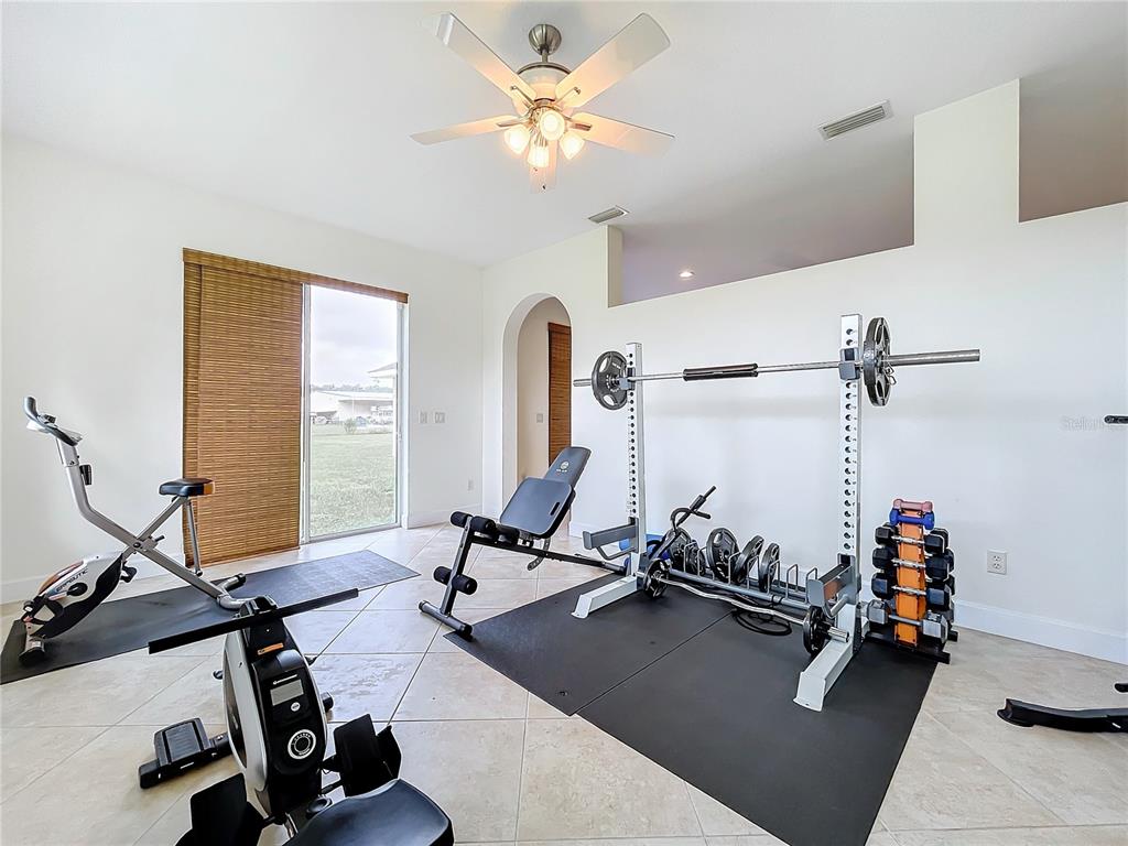 275 Cr 552 Bushnell Bushnell, FL 33513 - Photo 27 of 69 a view of a room with gym equipment