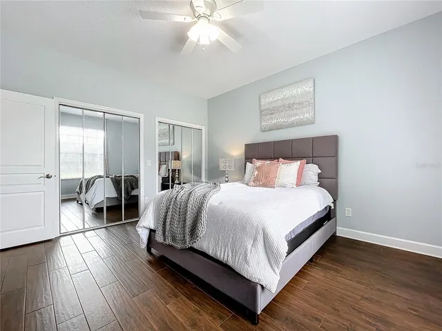 a living room with furniture a rug and a window