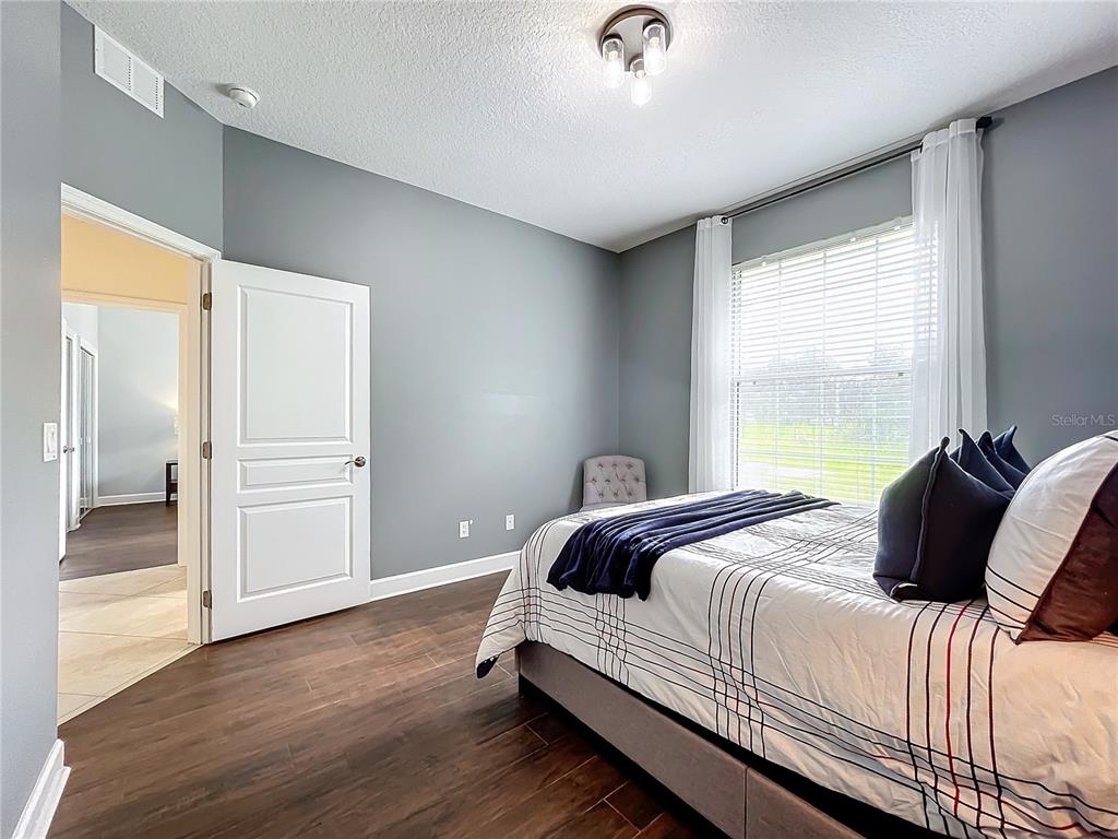 275 Cr 552 Bushnell Bushnell, FL 33513 - Photo 45 of 69 a bedroom with a bed and a large window