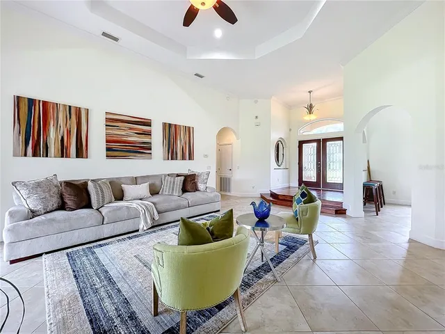 a view of kitchen with microwave and cabinets