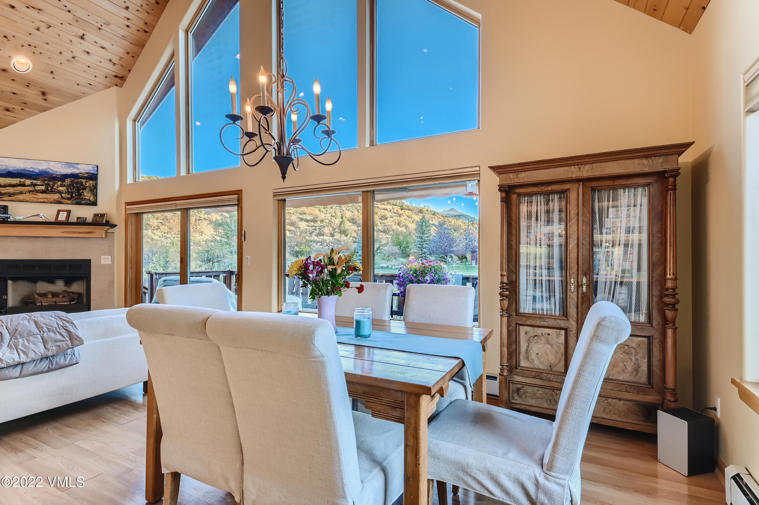 1476 Lake Creek Road Edwards, CO 81632 - Photo 11 of 35 a view of a dining room with furniture window and wooden floor