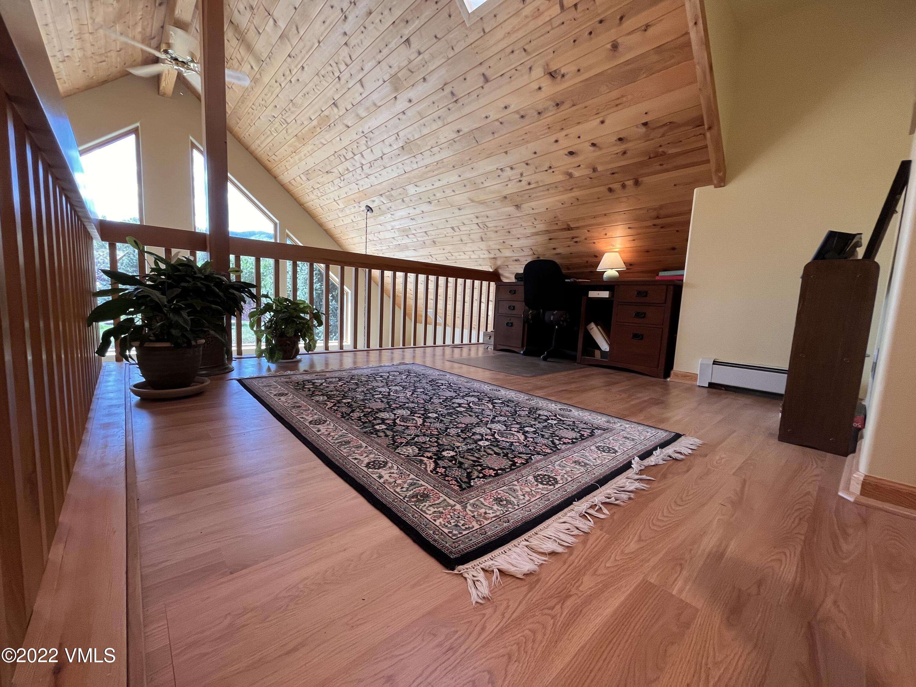 1476 Lake Creek Road Edwards, CO 81632 - Photo 18 of 35 wooden floor with furniture