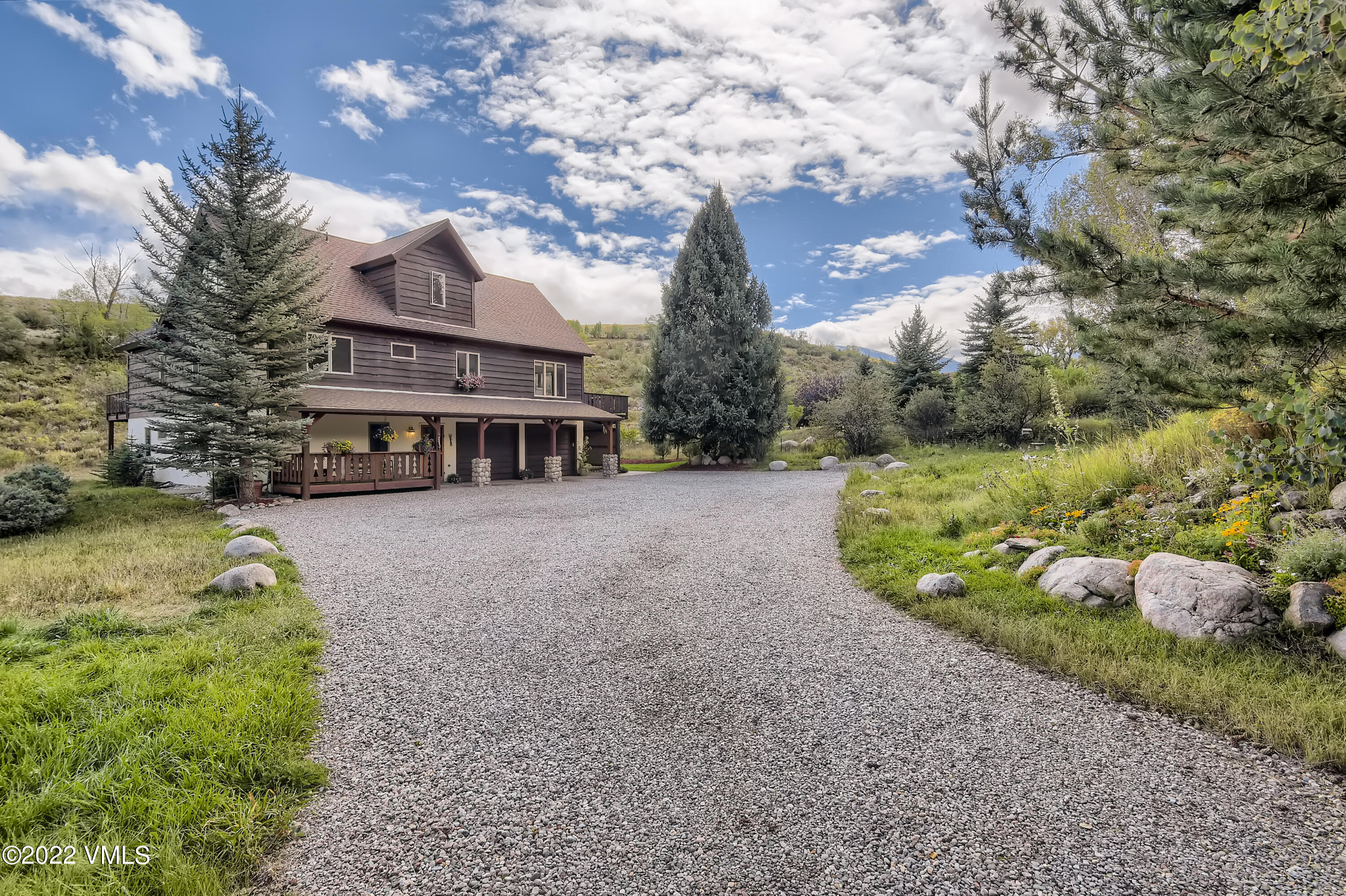 1476 Lake Creek Road Edwards, CO 81632 - Photo 2 of 35 a view of a house with a yard
