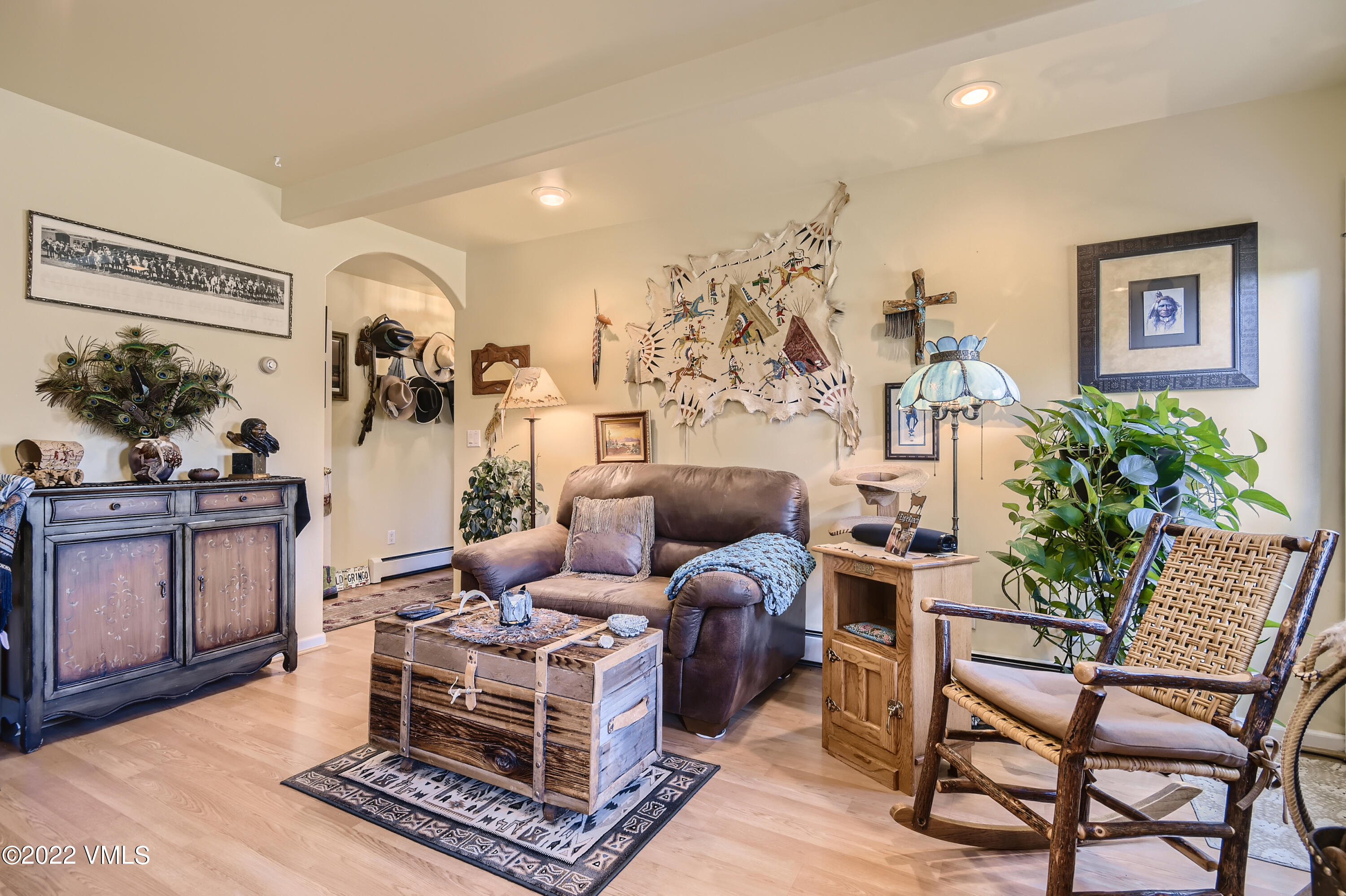 1476 Lake Creek Road Edwards, CO 81632 - Photo 23 of 35 a living room with furniture and wooden floor