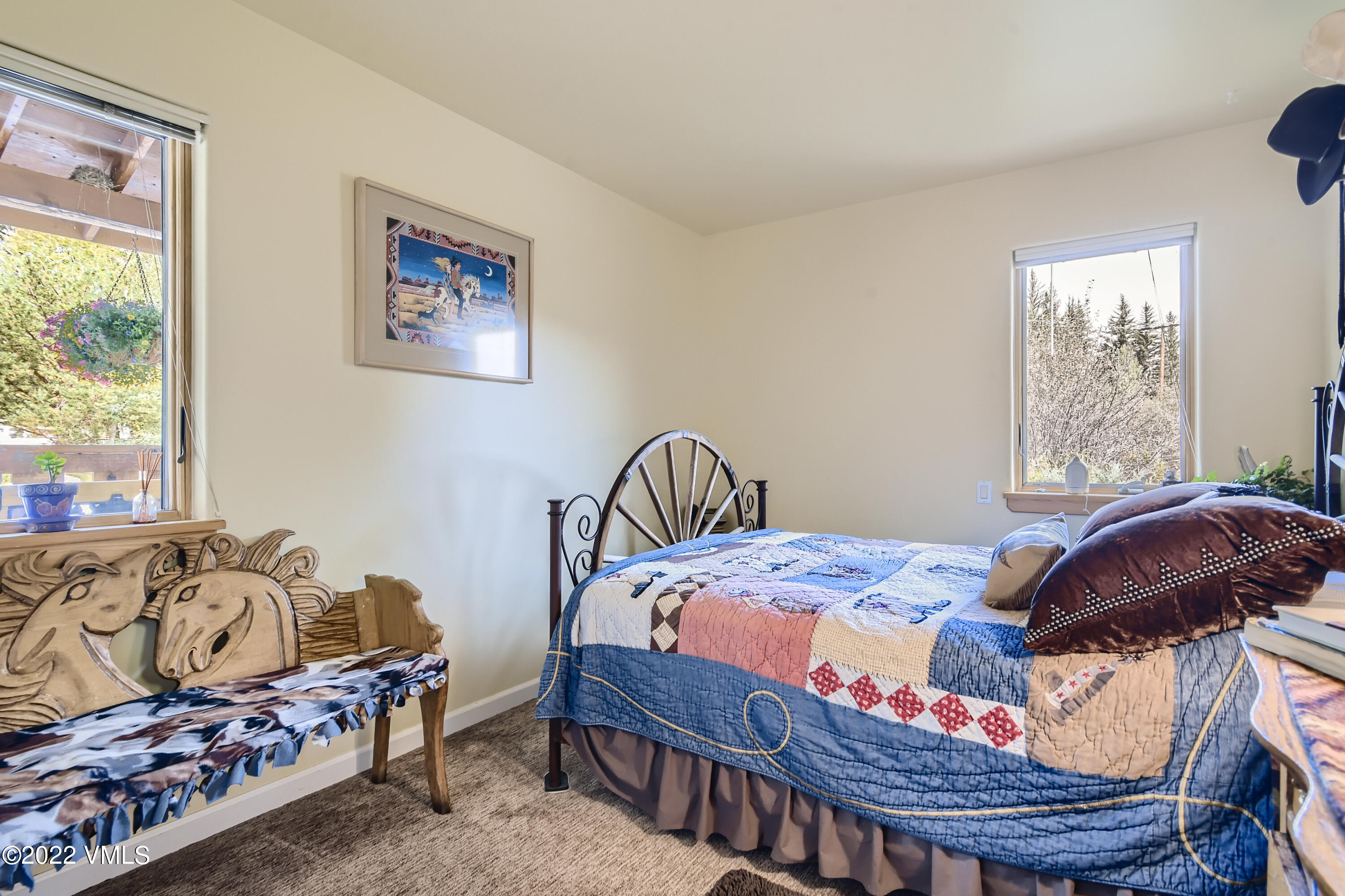 1476 Lake Creek Road Edwards, CO 81632 - Photo 24 of 35 a bedroom with a bed and a window