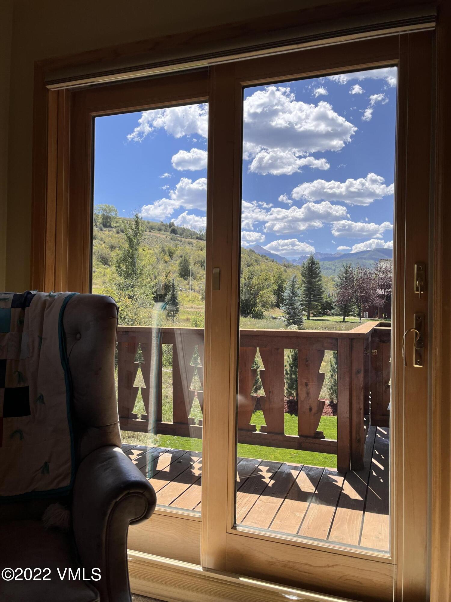 1476 Lake Creek Road Edwards, CO 81632 - Photo 27 of 35 a view of a porch with a swing