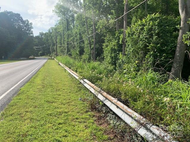 7.67-ac Holbert Cove Road, Unit 7 67 AC Saluda, NC 28773 - Photo 6 of 10 a view of a yard with potted plants