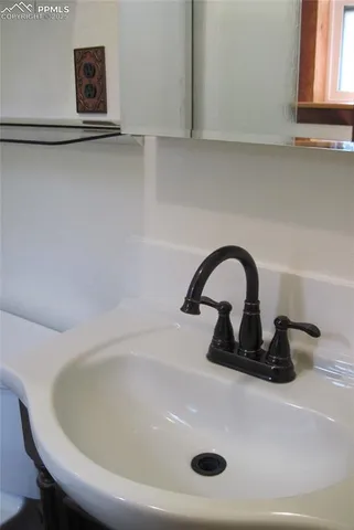 a close view of a sink and tap