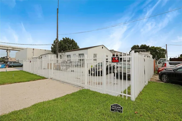 a view of a porch with a small yard