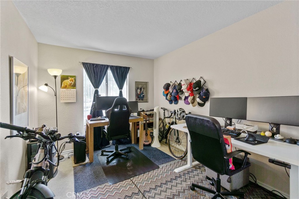 25752 View Pointe, Unit 3B Lake Forest, CA 92630 - Photo 17 of 22 a view of a room with gym equipment