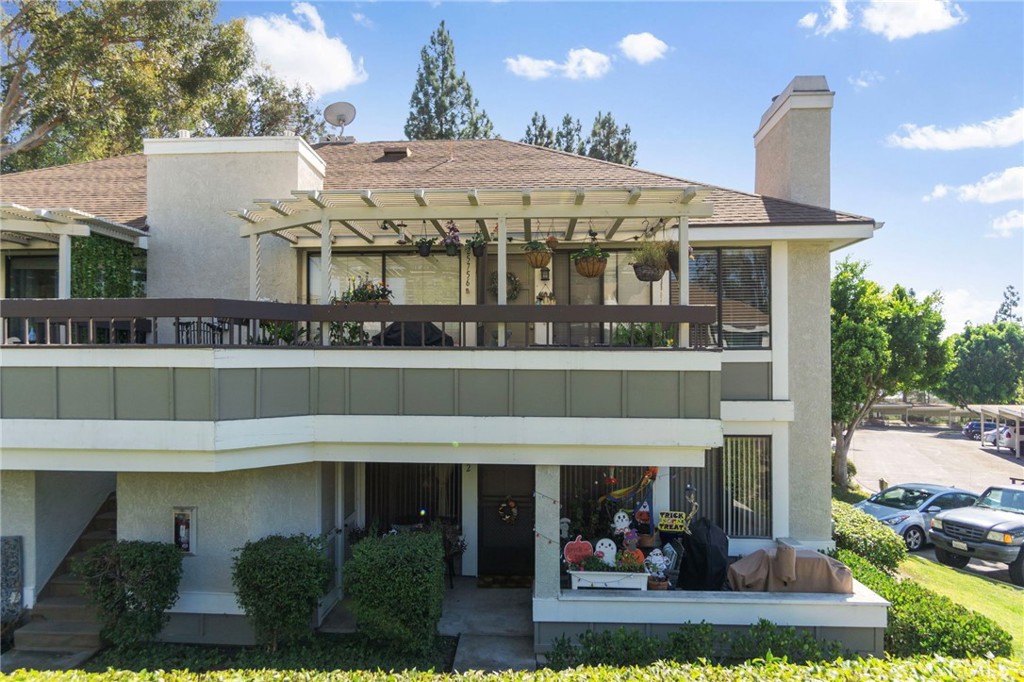 25752 View Pointe, Unit 3B Lake Forest, CA 92630 - Photo 20 of 22 a view of a building with a balcony