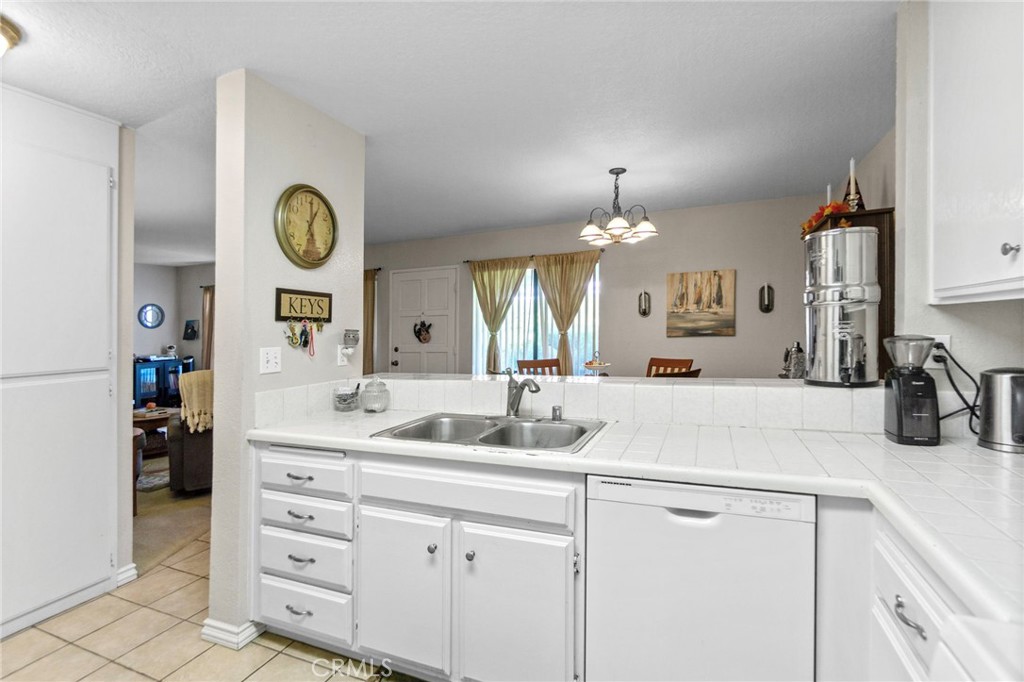 25752 View Pointe, Unit 3B Lake Forest, CA 92630 - Photo 9 of 22 a bathroom with a sink and a mirror