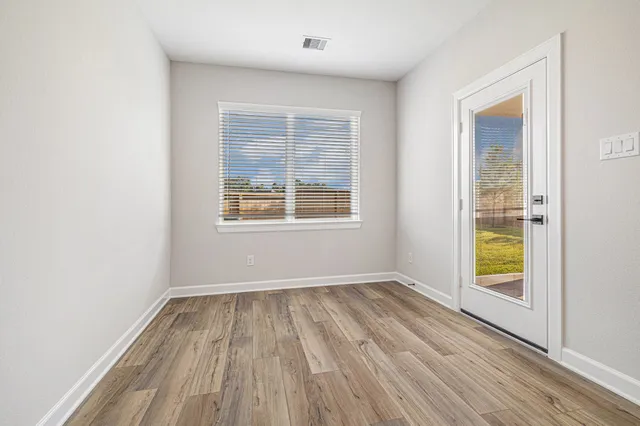 an empty room with windows