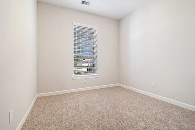 an empty room with a window