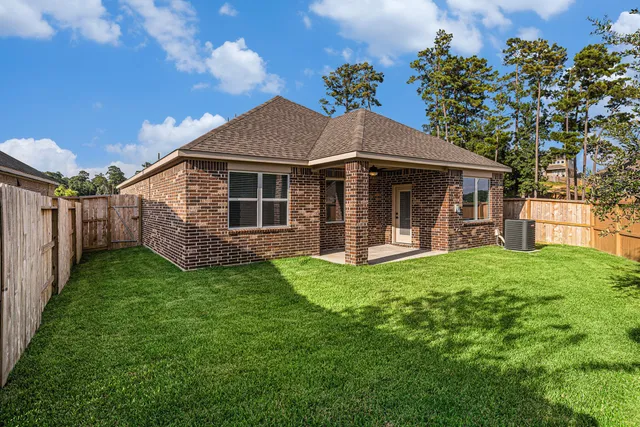 a front view of a house with yard