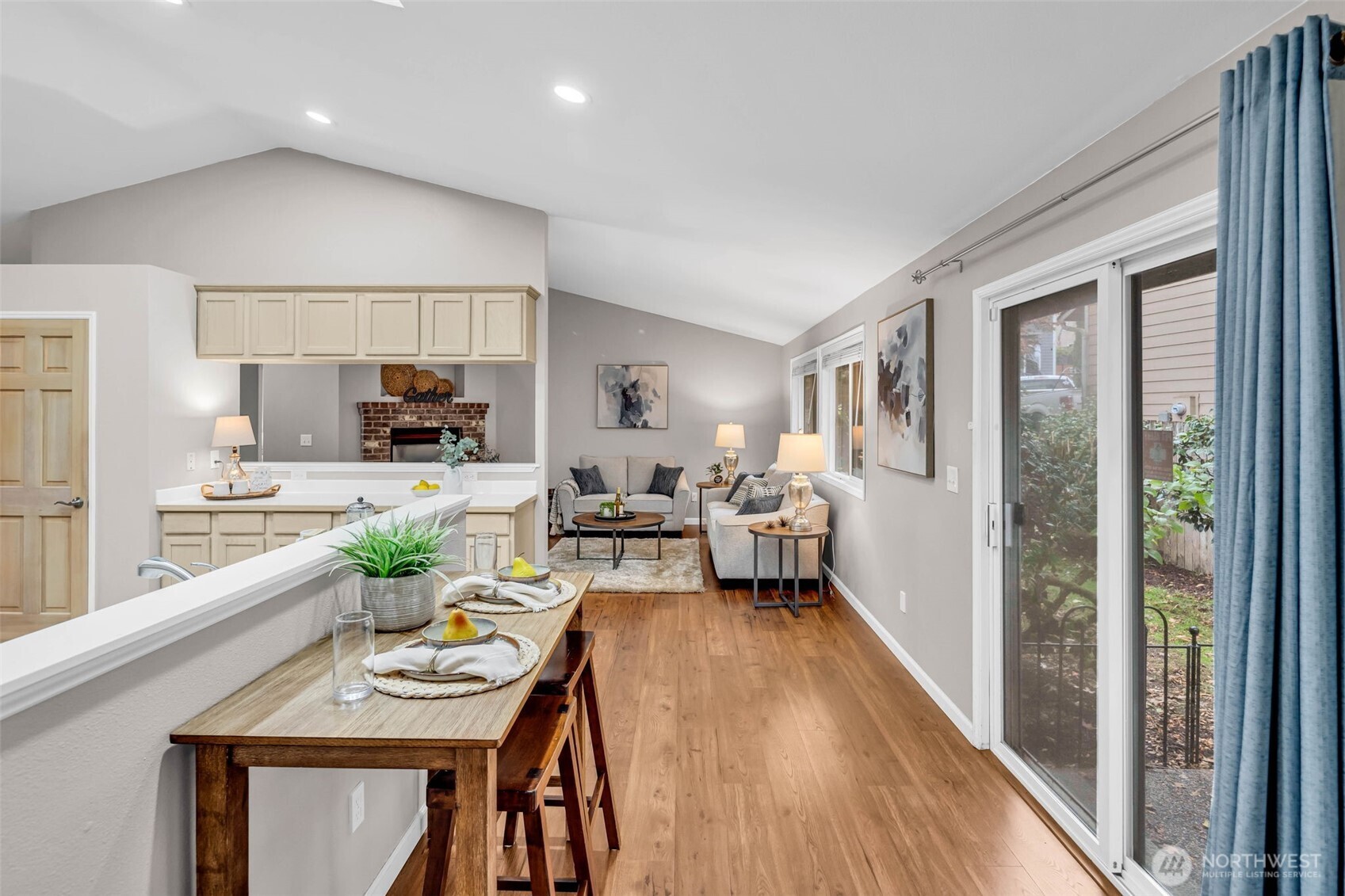 3212 200th Place Southeast Bothell, WA 98012 - Photo 11 of 40 a living room with furniture windows and wooden floor