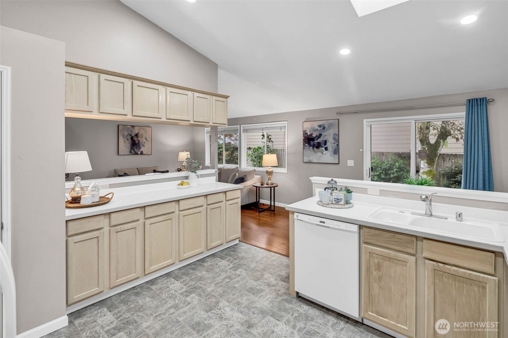 3212 200th Place Southeast Bothell, WA 98012 - Photo 15 of 40 a kitchen with sink stove and cabinets