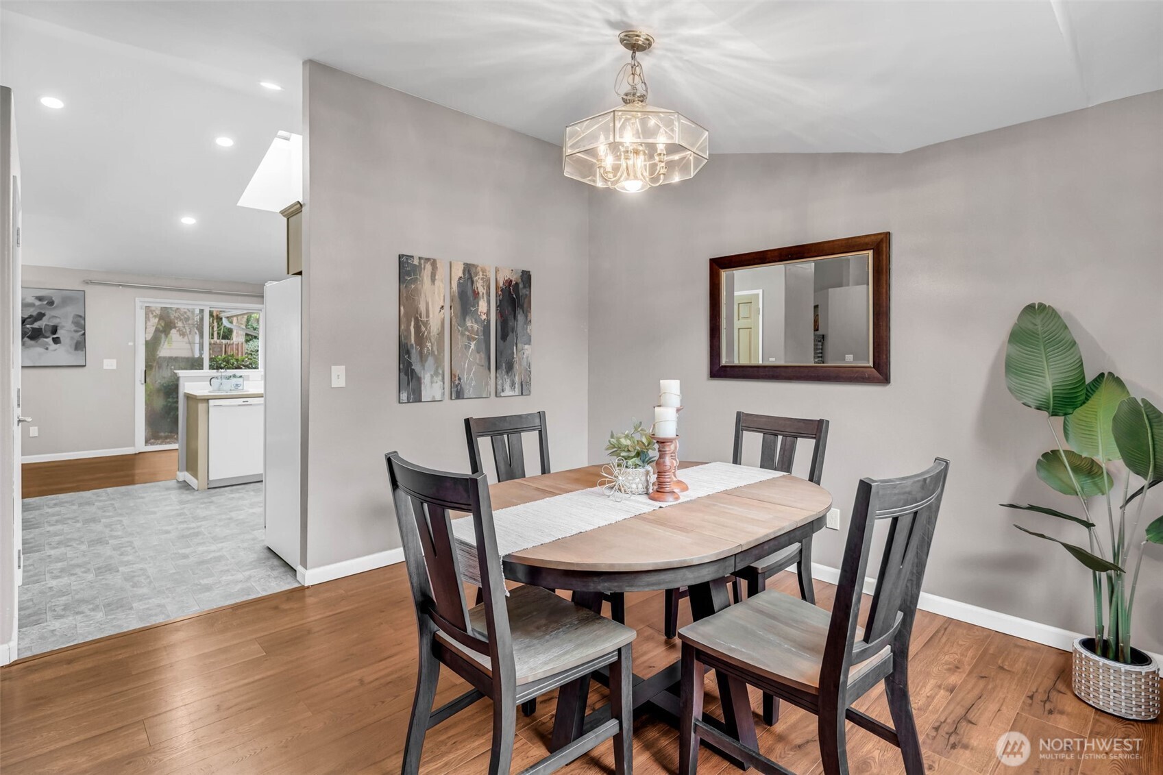 3212 200th Place Southeast Bothell, WA 98012 - Photo 17 of 40 a view of a dining room with furniture and chandelier