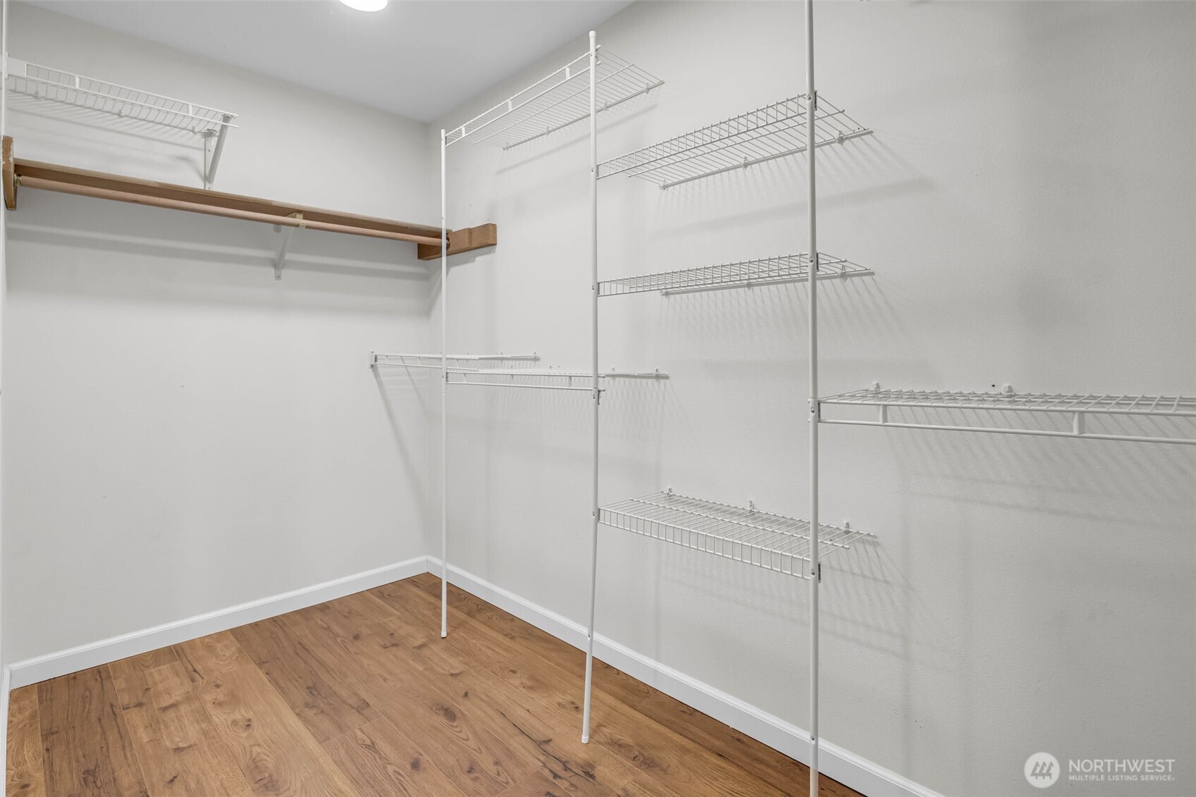 3212 200th Place Southeast Bothell, WA 98012 - Photo 26 of 40 a view of a room with wooden floor