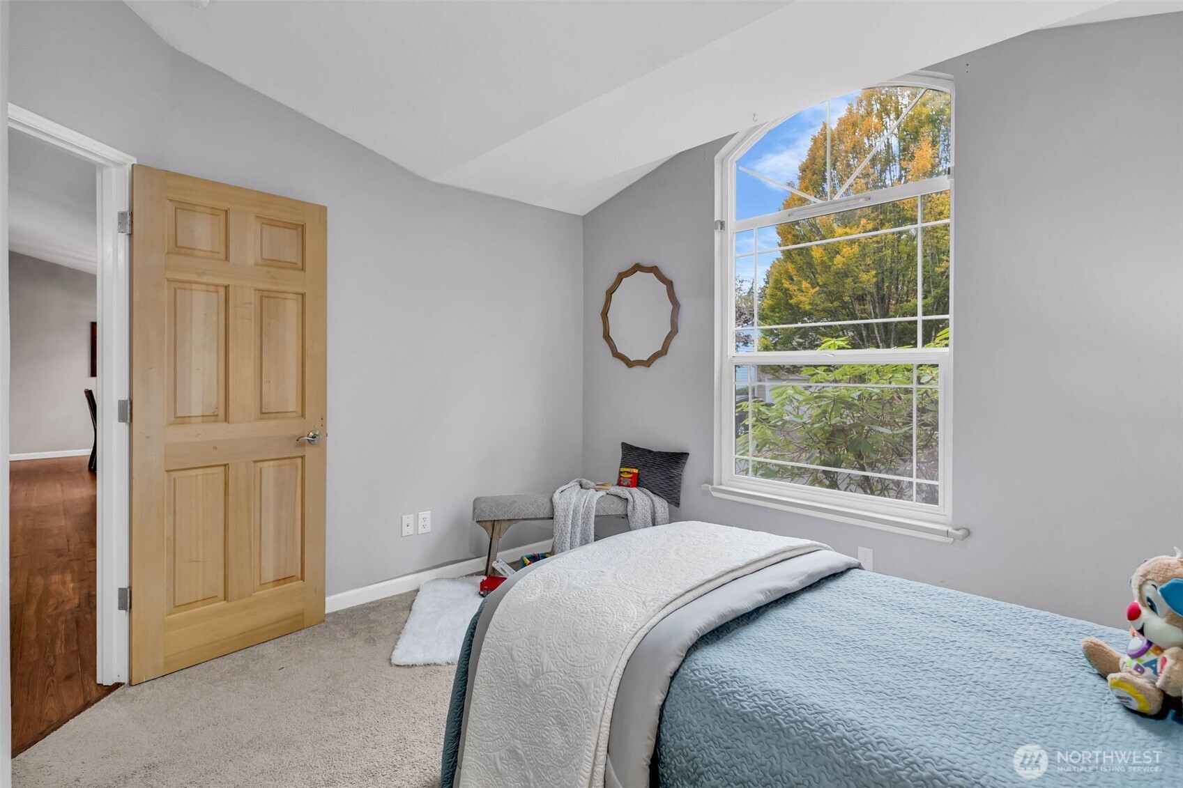 3212 200th Place Southeast Bothell, WA 98012 - Photo 28 of 40 a bedroom with a bed and a window