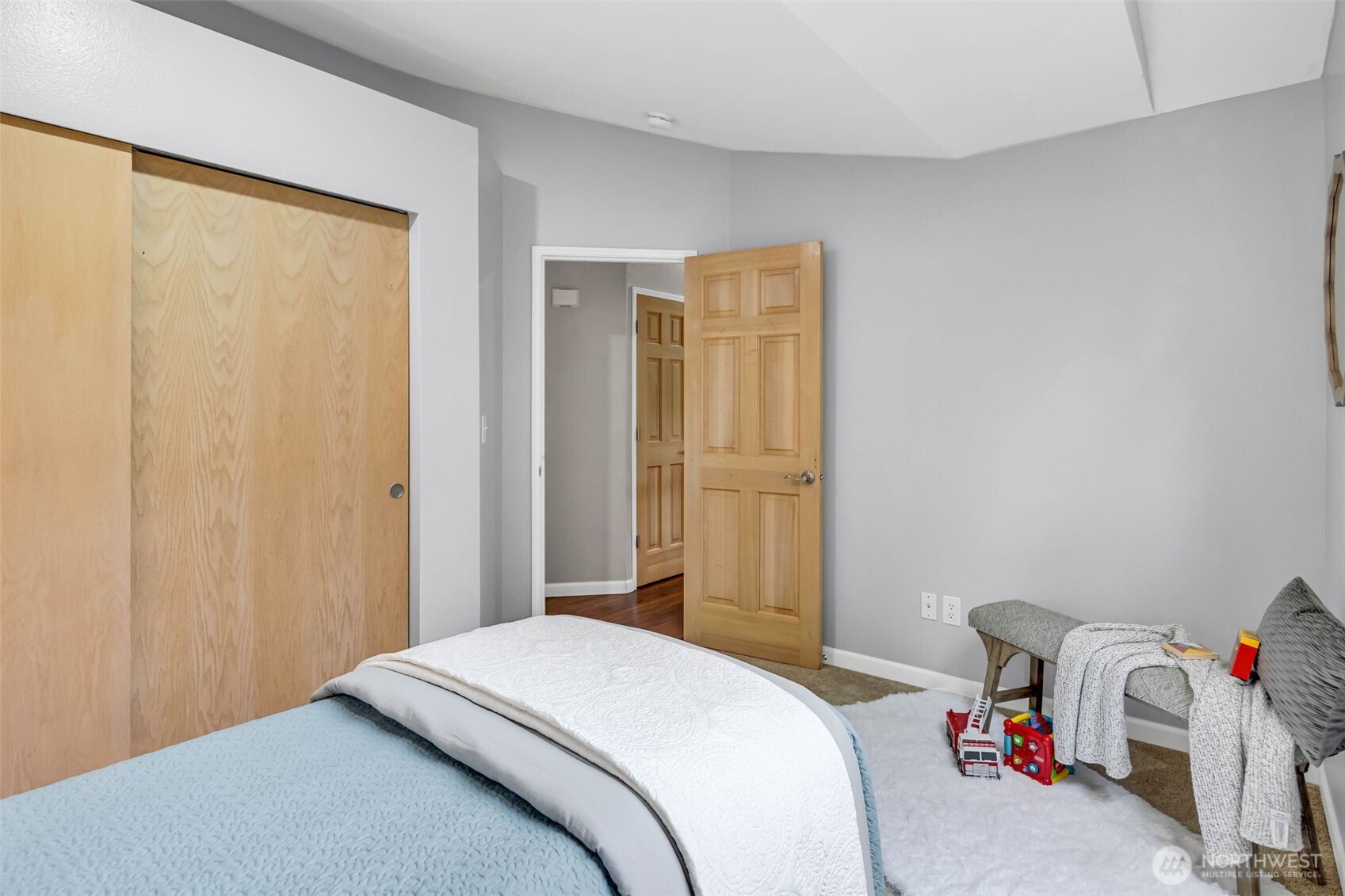 3212 200th Place Southeast Bothell, WA 98012 - Photo 29 of 40 a bedroom with a bed and a window