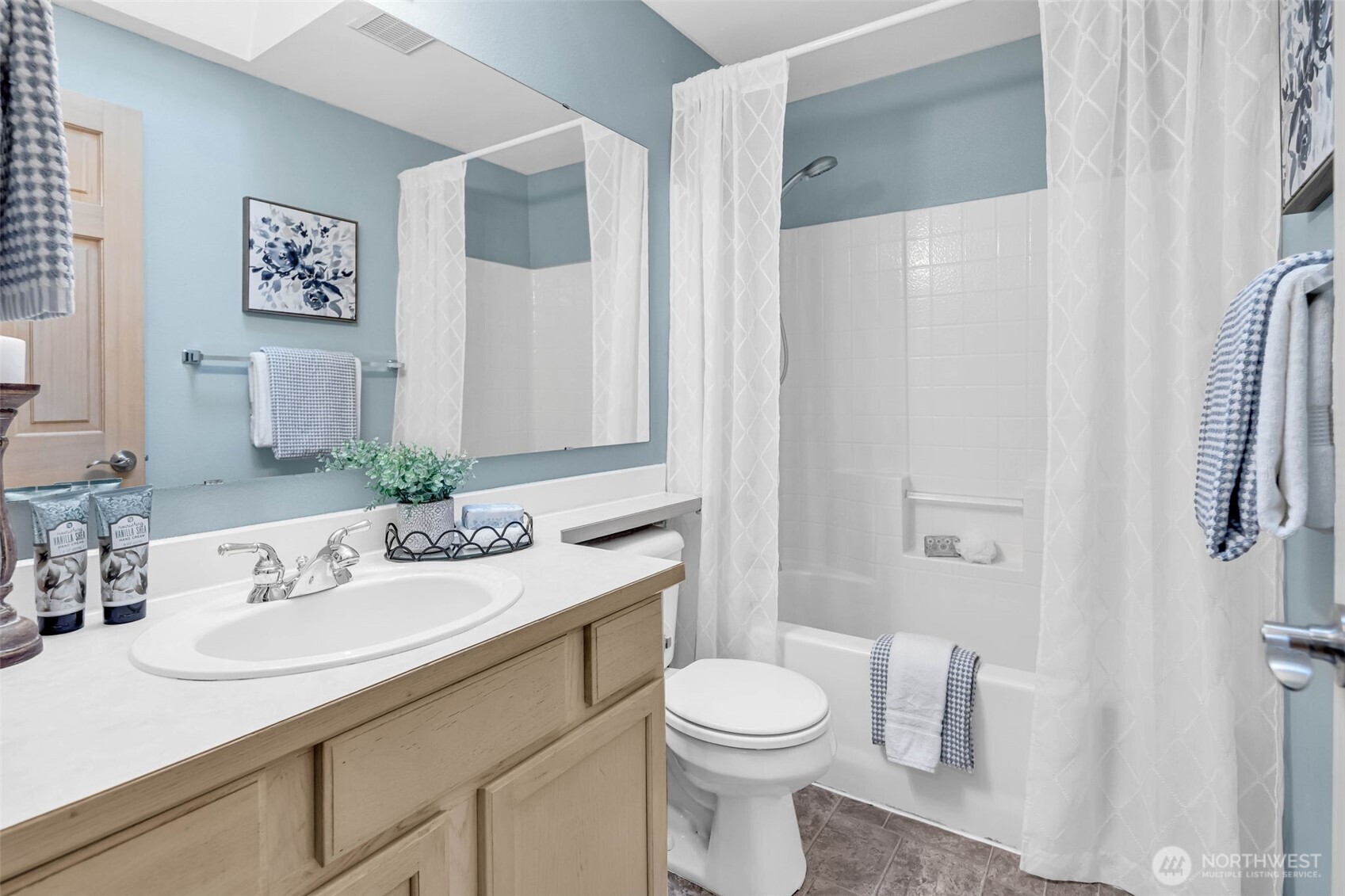 3212 200th Place Southeast Bothell, WA 98012 - Photo 30 of 40 a bathroom with a sink toilet and shower