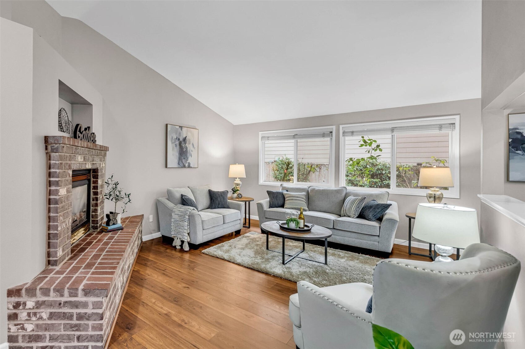 3212 200th Place Southeast Bothell, WA 98012 - Photo 5 of 40 a living room with furniture and a large window