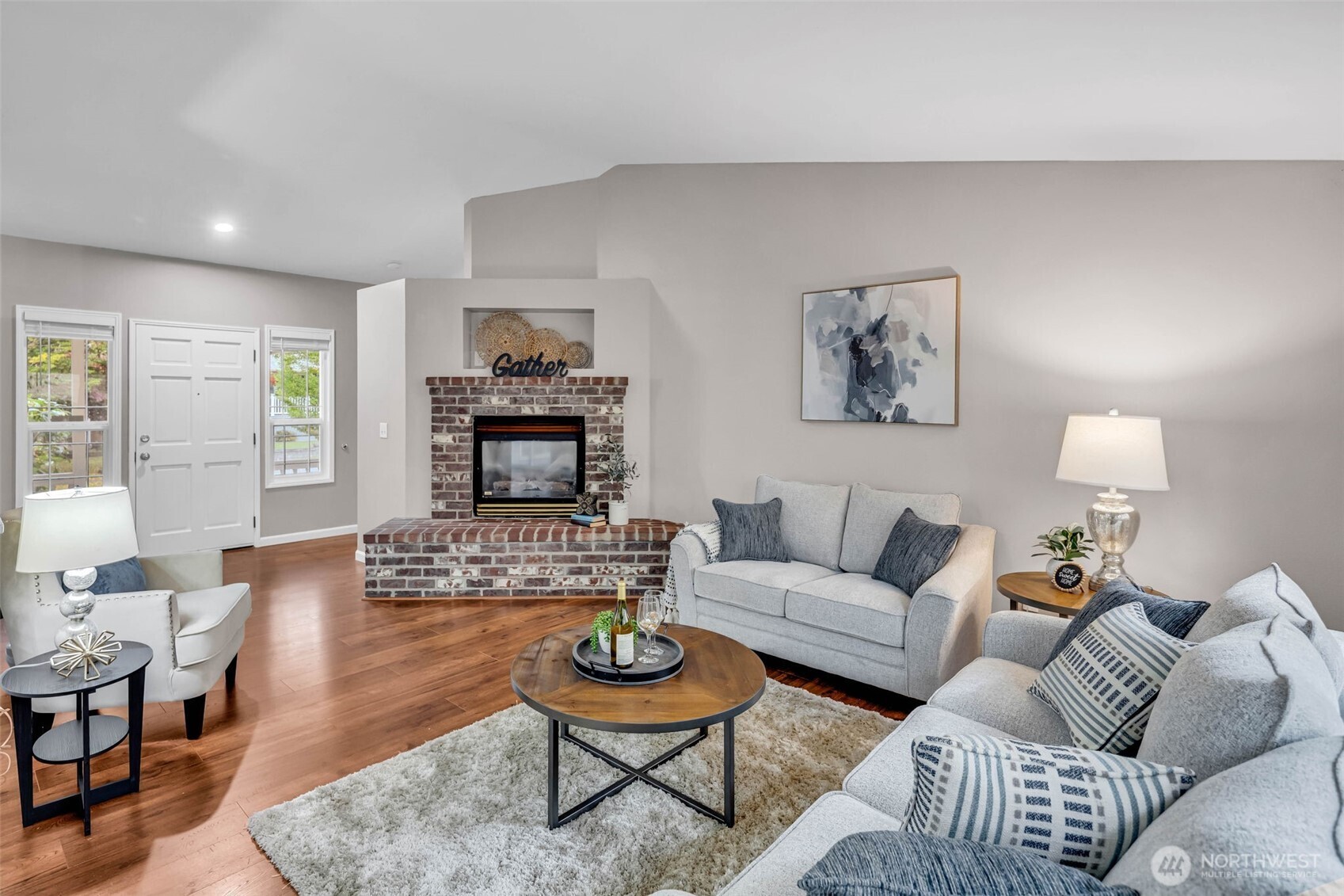 3212 200th Place Southeast Bothell, WA 98012 - Photo 6 of 40 a living room with furniture and a wooden floor