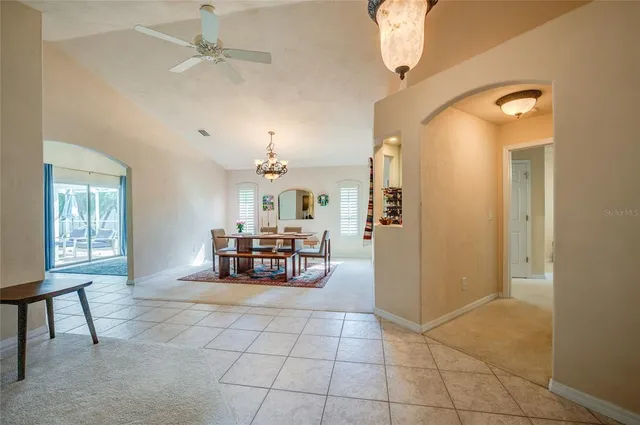 a kitchen with a sink a counter top space and stainless steel appliances