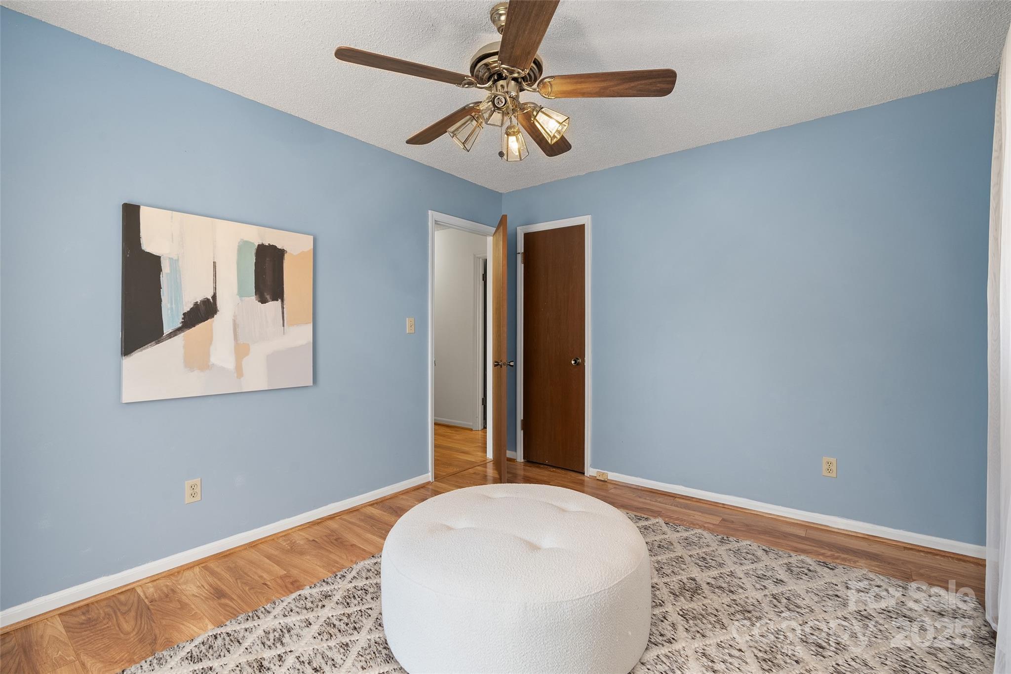 67 Overlook Road Asheville, NC 28803 - Photo 18 of 25 a view of a livingroom with a chandelier fan