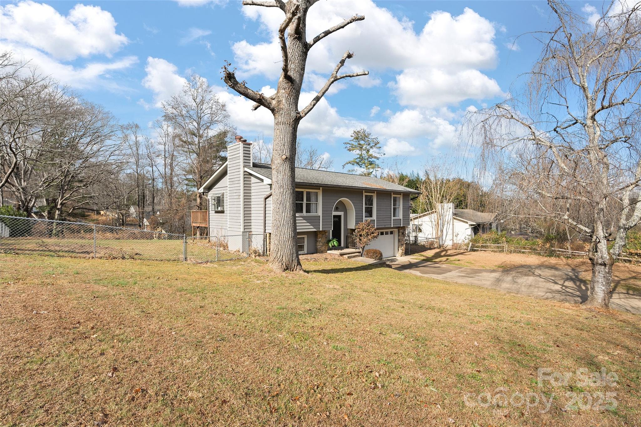 67 Overlook Road Asheville, NC 28803 - Photo 2 of 25 a view of a house with backyard porch and sitting area