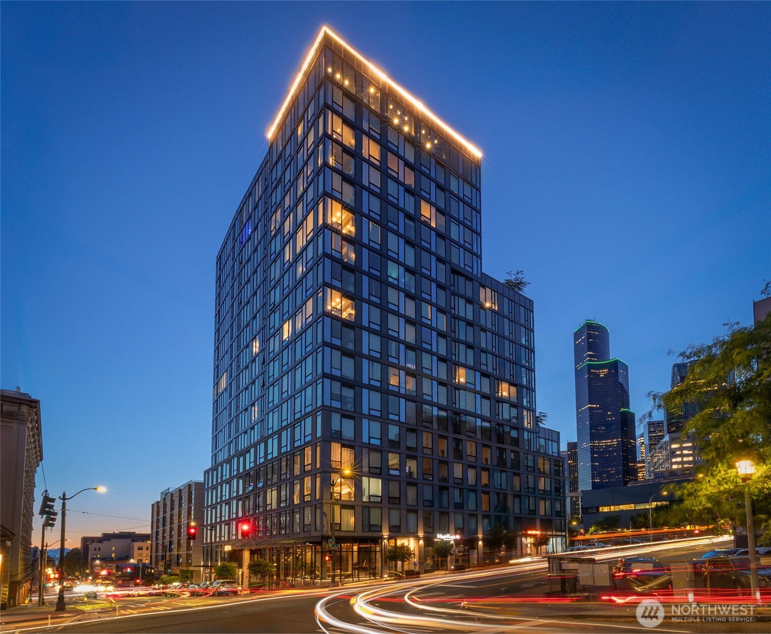 450 South Main Street, Unit 903 Seattle, WA 98104 - Photo 12 of 25 a view of a tall building next to a road